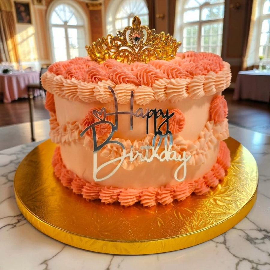 Peach ruffled buttercream cake with a tiara
